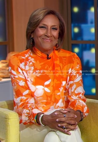 Robin’s orange floral blouse on Good Morning America
