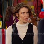 Sarah’s black vest and sneakers on Days of our Lives