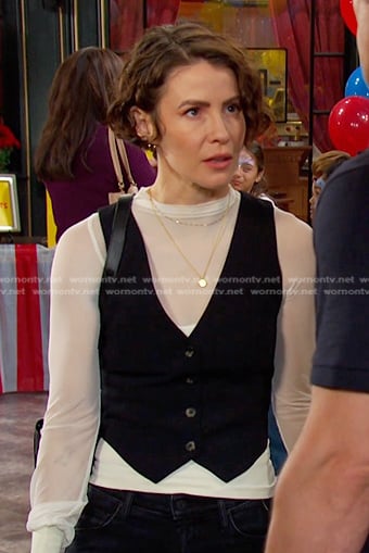 Sarah’s black vest and sneakers on Days of our Lives
