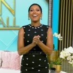 Tamron’s black sleeveless printed dress on Tamron Hall Show