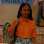 Tori’s orange cropped top and denim mini skirt on All American