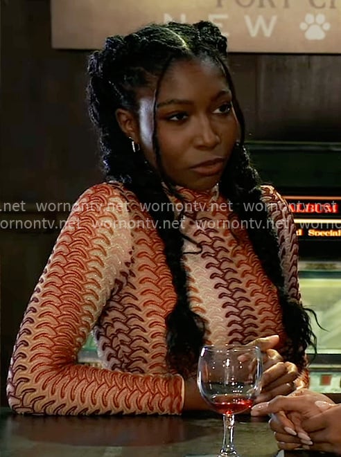 Trina's orange patterned knit crop top on General Hospital