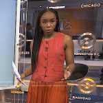 Zinhle’s pink vest and orange pleated skirt on NBC News Daily