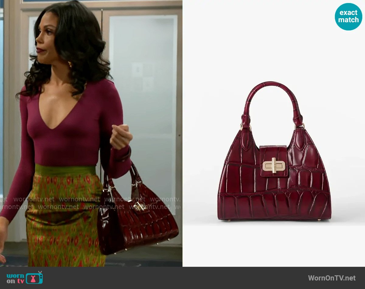 Brahmin Adrian Bag in Merlot Nerina worn by Dani Dupree (Karla Mosley) on Beyond the Gates