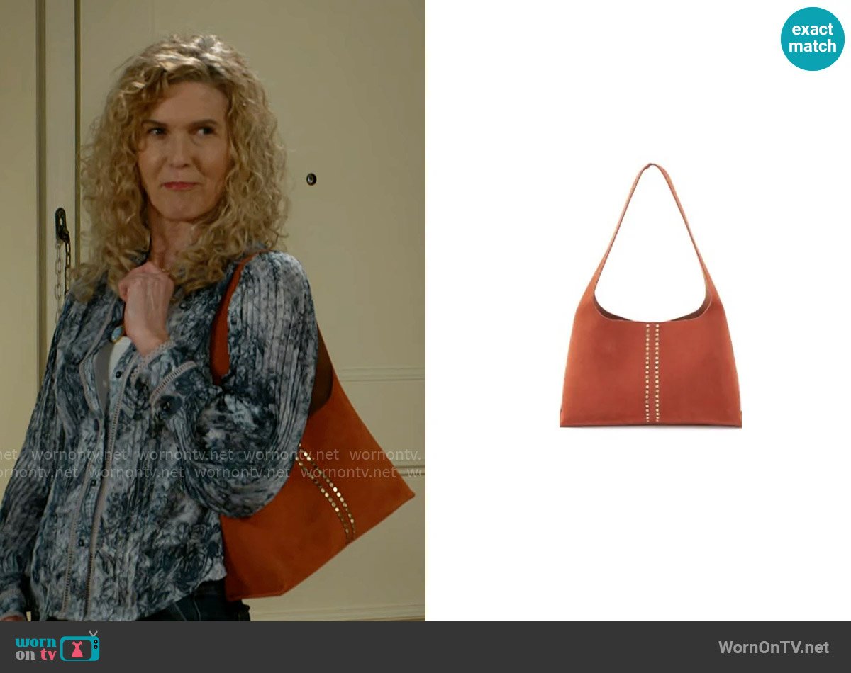 Hobo Joni Studded Bag in Cognac worn by Jan Morgan (Jerri Tubbs) on Beyond the Gates