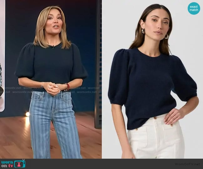 Kit’s navy puff sleeve top on Access Hollywood