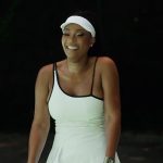 Angela’s white asymmetric strap mini dress on The Real Housewives of Atlanta