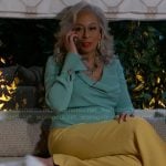 Anita’s green cowl-neck top on Beyond the Gates