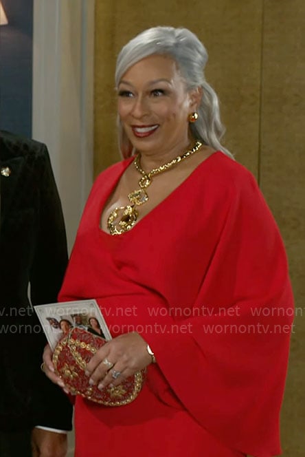 Anita’s red wide sleeve evening gown on Beyond the Gates