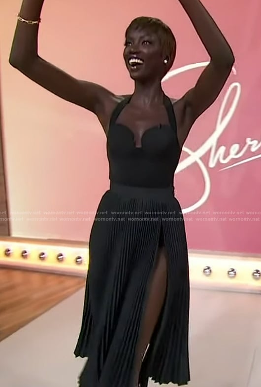 Anok Yai's black pleated skirt and top on Sherri