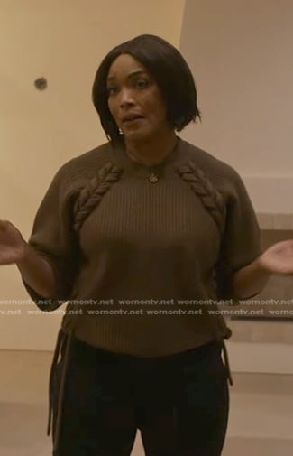 Athena’s khaki lace-up knit sweater on 9-1-1