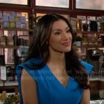 Audra’s blue v-neck cape sheath dress on The Young and the Restless