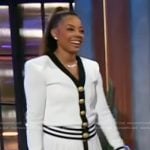 Monique Rodriguez’s white contrast cardigan and mini skirt on The Kelly Clarkson Show
