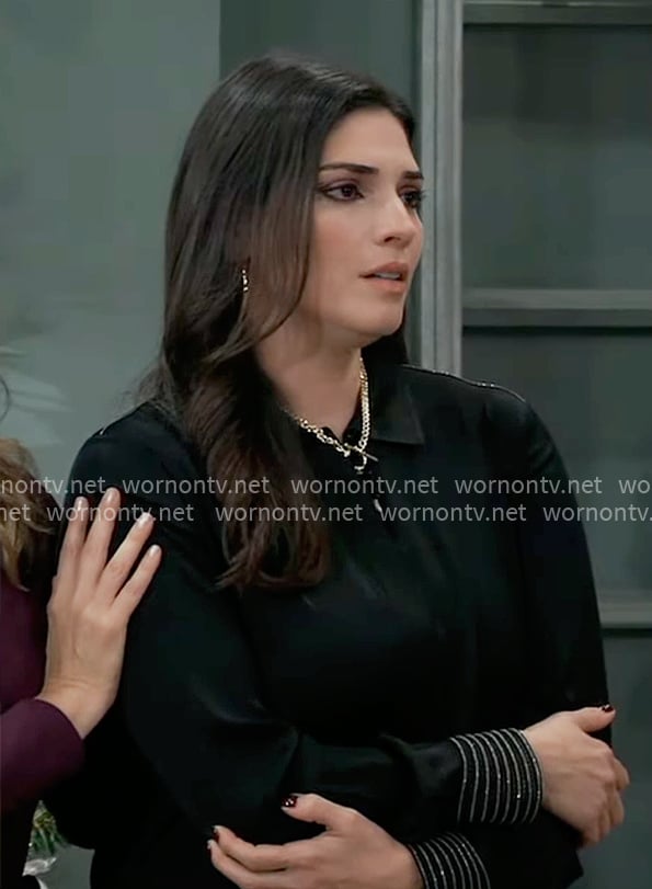 Brook Lynn's black blouse with metallic stripe cuffs on General Hospital