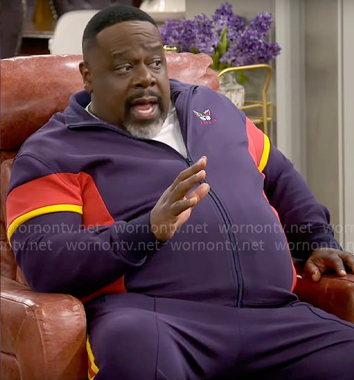 Calvin’s navy colorblock tracksuit on The Neighborhood