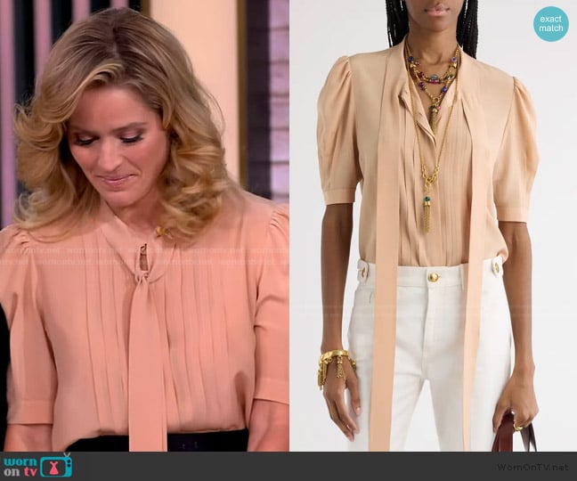 Sara’s beige tie neck top on The View