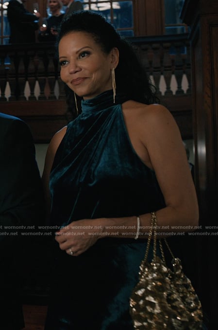 Claudia’s green velvet halter dress on Elsbeth
