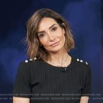 Courtney Lopez’s black button shoulder top on Access Hollywood