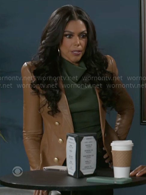 Dani’s green draped top and leather blazer on Beyond the Gates