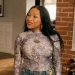 Delilah’s printed long sleeve top on The Equalizer