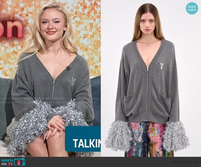 Doublet Cheerleading pom-pom cardigan worn by Zara Larsson on Access Hollywood