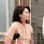 Elizabeth’s peach orange hoodie on General Hospital