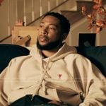 Emmett’s beige hoodie on The Chi