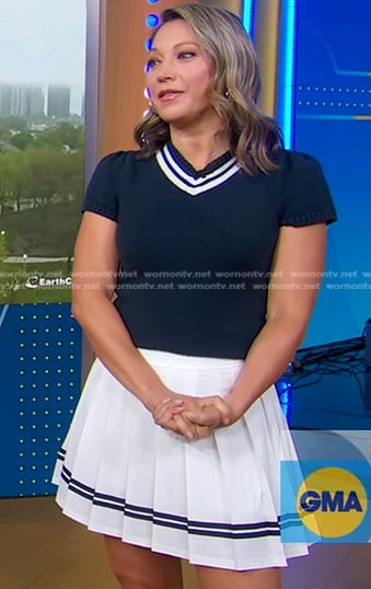 Ginger’s navy short sleeve sweater and white pleated mini skirt on Good Morning America