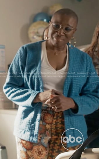 Hen’s blue cardigan and patchwork pants on 9-1-1