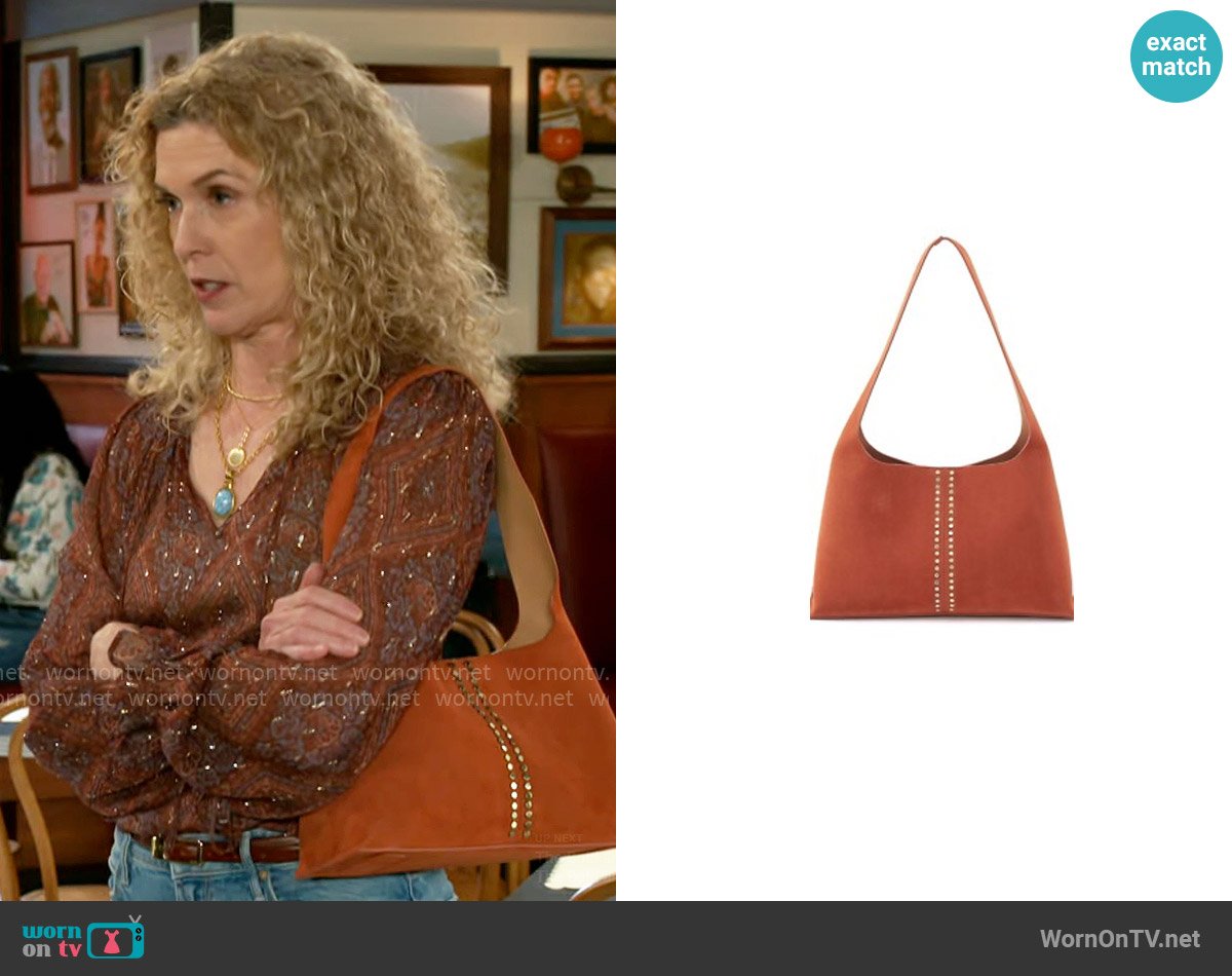 Hobo Joni Studded Bag in Cognac worn by Jan Morgan (Jerri Tubbs) on Beyond the Gates