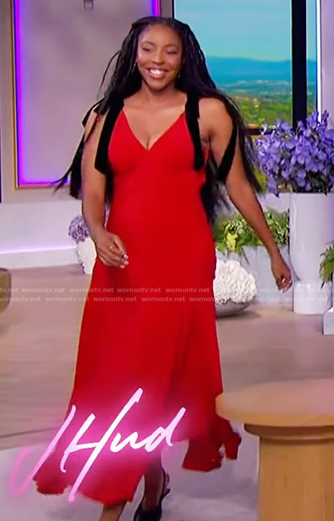 Jessica Williams red dress with contrast bows on The Jennifer Hudson Show