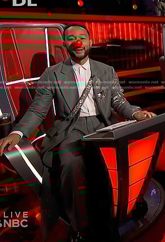 John Legend’s grey embellished long blazer and pleated pants on The Voice