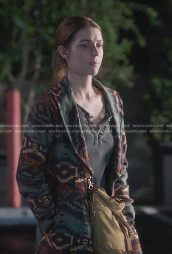 Jules’ grey lace-trim top and aztec print coat on Greys Anatomy