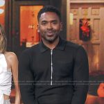 Justin’s black half zip sweater on E! News