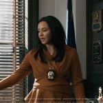Kaya’s brown wrap top on Elsbeth