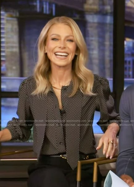 Kelly’s black polka dot print tie neck top on Live with Kelly and Mark