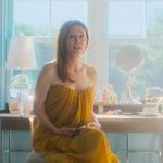 Kiki’s yellow draped strapless gown on Sirens