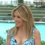 Kit’s blue printed dress with mini bows on Access Hollywood