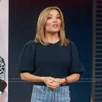 Kit's navy puff sleeve top and striped jeans on Access Hollywood