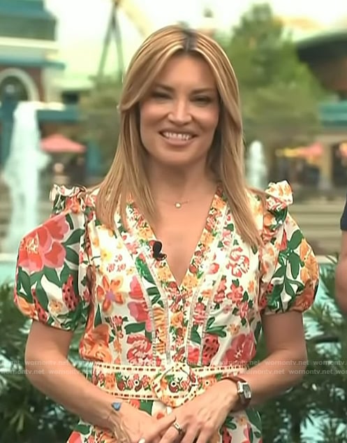 Kit’s floral print belted romper on Access Hollywood