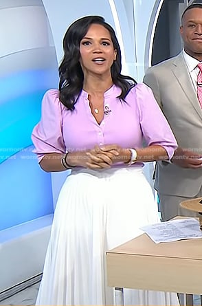 Laura’s pink puff sleeve top and white pleated skirt on Today