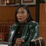 Leslie’s long green snake leather coat on Beyond the Gates