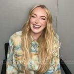 Lindsay Lohan’s belted trench dress on E! News
