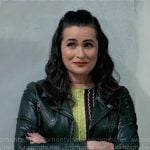 Lois’s metallic colorblock knit top and leather jacket on General Hospital