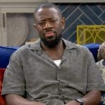 Malcolm’s khaki green triangle shirt on The Neighborhood