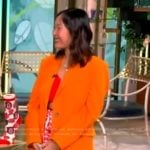 Mary Gui’s orange blazer and printed mini skirt on The View
