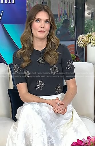 Meghann Fahy’s grey embellished sweater and white skirt on Today