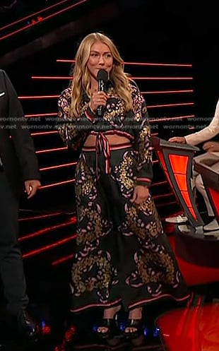 Mikaela Shiffrin’s black floral cropped shirt and skirt on The Voice