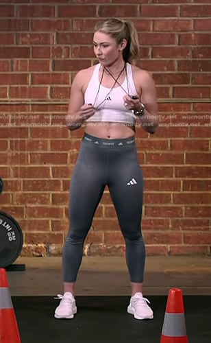 Mikaela Shiffrin’s white sports bra and leggings on The Voice