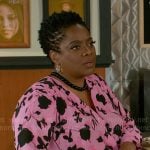 Mona’s pink floral blouse on Beyond the Gates